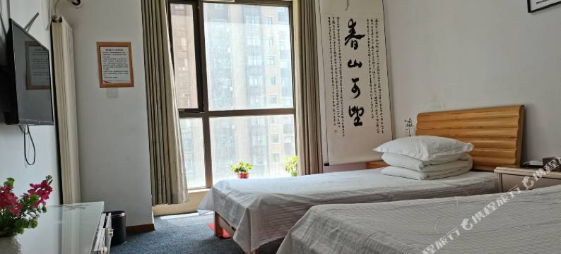 郑州悠然居青旅(郑东万象城高铁东站店)图片