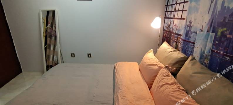 东篱青年旅舍(信阳火车站天润广场店)图片