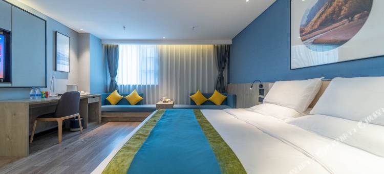 丽橙酒店·智(宜昌三峡大学CBD购物中心智能店)图片