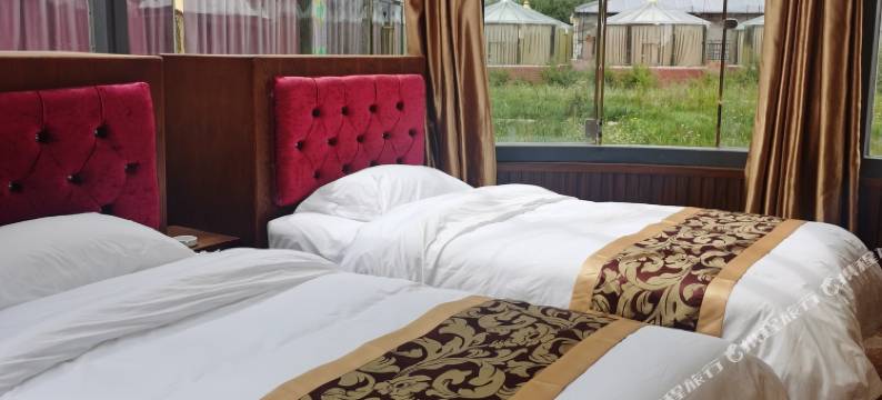 红原德勒央康酒店图片