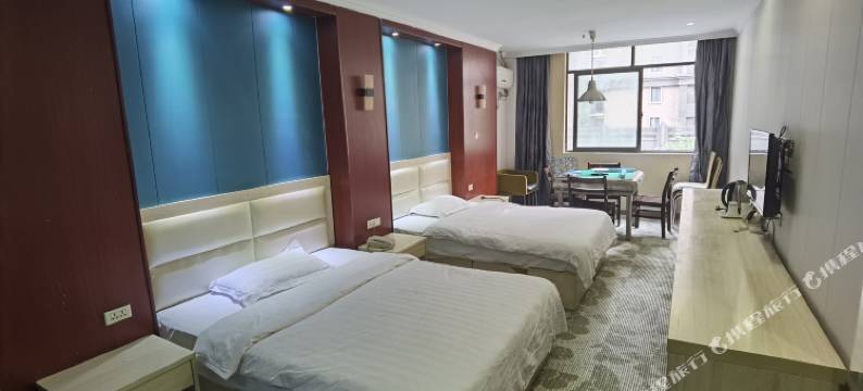 东兴假日酒店(武汉科技大学青山校区科普公园地铁站店)图片