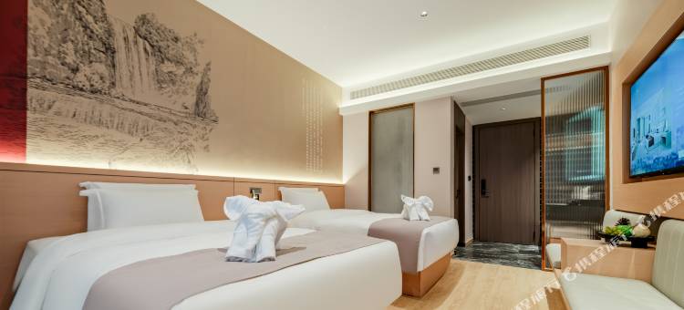 爽逸同呈酒店图片