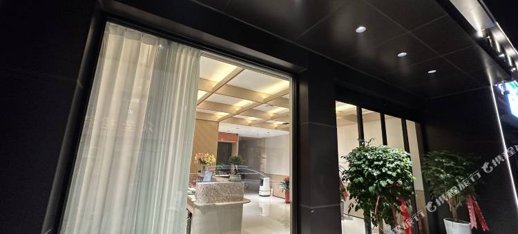橙子酒店(东营石油大学万达广场西城店)图片