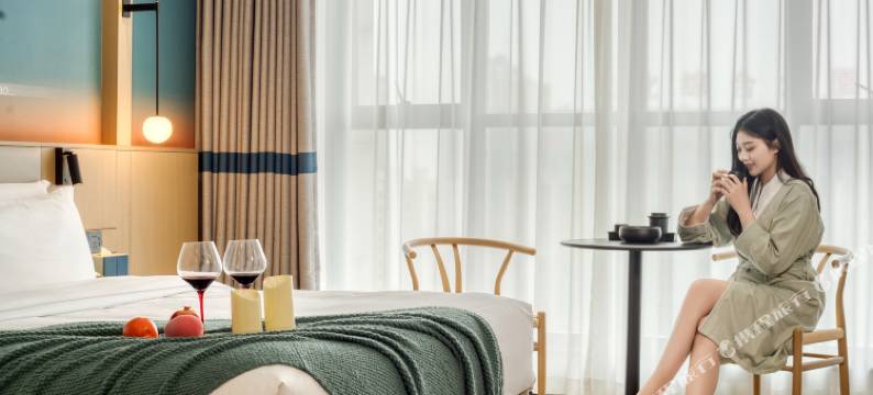 嵊州文澜东方丨Cinema·SunnyBalcony城景酒店(市中心吾悦广场店)图片