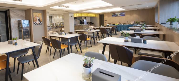 嵊州琴漫酒店(吾悦广场国际会展中心店)图片