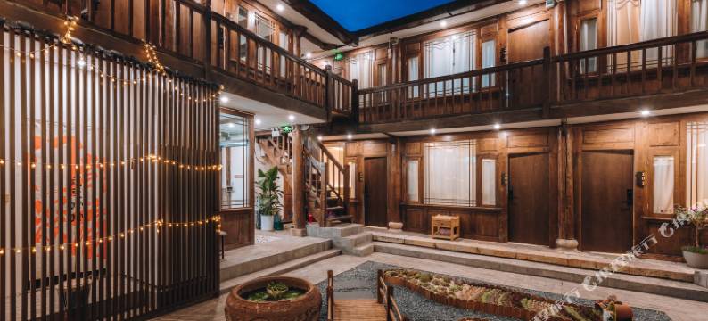 芳华设计师Music美宿(古城忠义市场店)图片