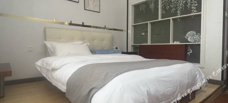 家洲泉旅居(延安西路贵阳客车站店)图片