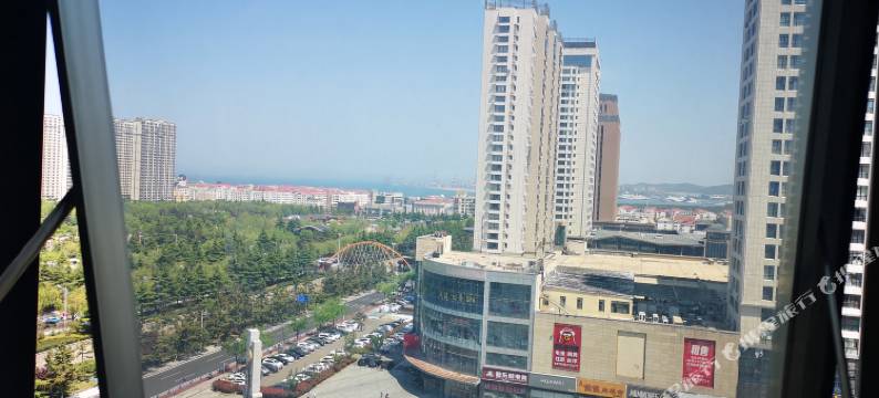 宏斌自助公寓(威海高铁站店)图片