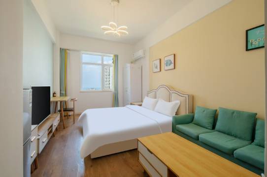 拂晓民宿(烟台大学万象汇店)