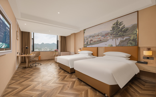 Vienna Hotel (Zhenxiong Street Xinhuayuan Branch) Over view