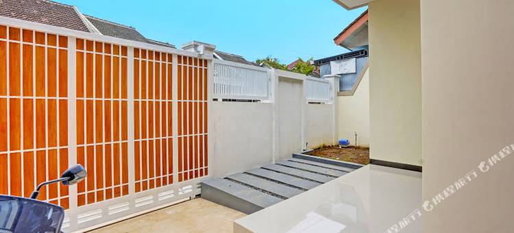 OYO 92209 康戈里科家庭民宿(Kanggo Riko Family Homestay Mitra Reddoorz)图片