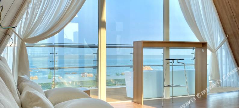 青岛金沙滩沐海度假民宿(凤凰之声大剧院店)图片