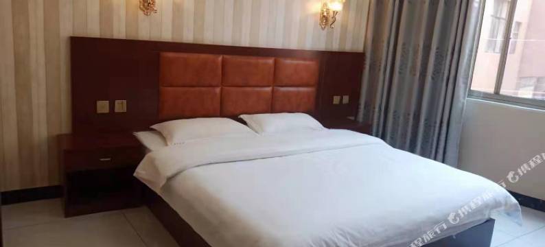 万佳宾馆(弥勒站店)图片