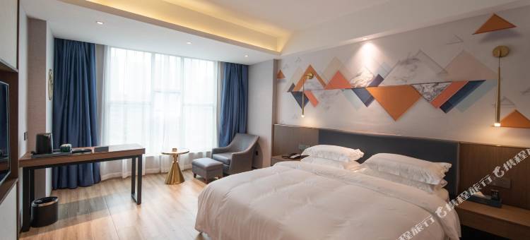 万纳轻雅酒店(涟钢沃尔玛五江建材店)图片