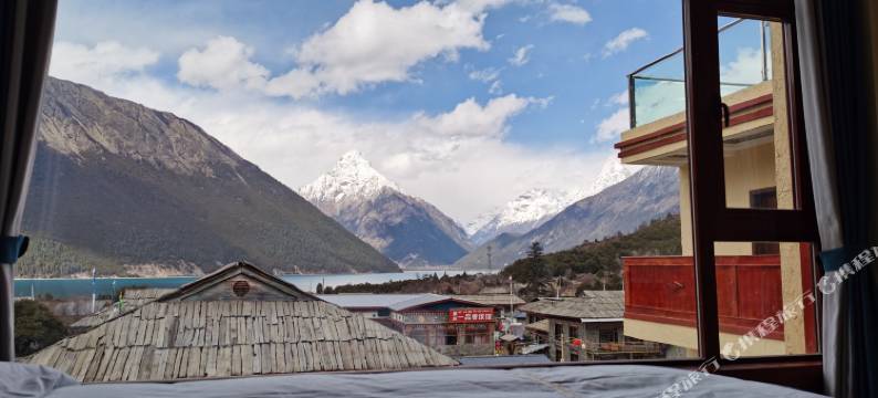 巴松措仓央观景民宿图片