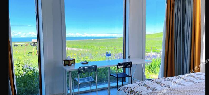 青海湖混序白房子民宿图片