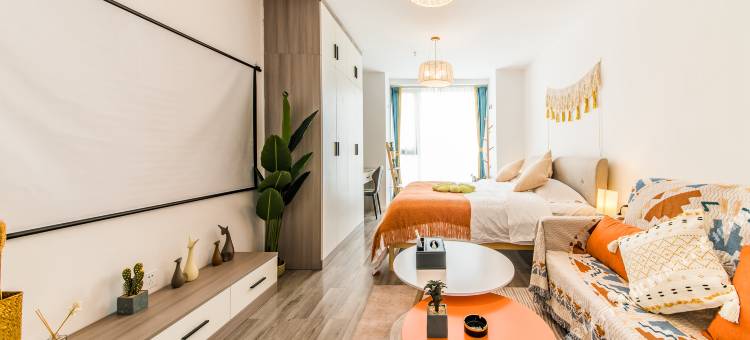 栖牛XINIU·投影自助公寓(乐山万达广场店)图片