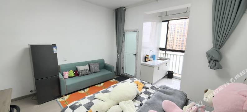 亿间居(阳光半岛店)图片