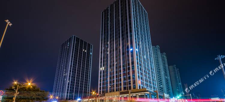 栖牛XINIU·投影自助公寓(乐山万达广场店)图片