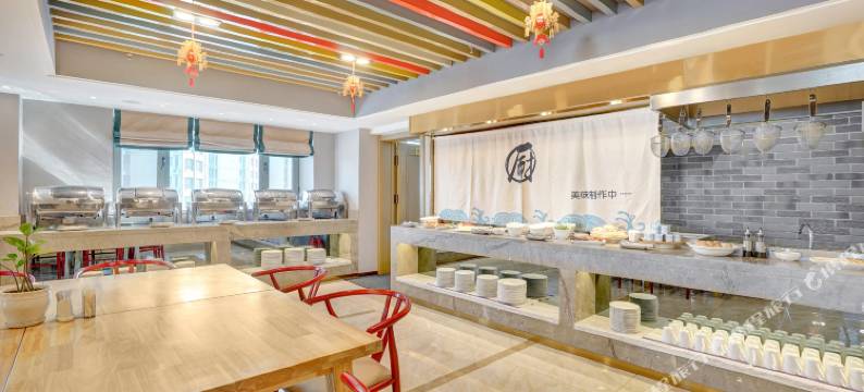 开心曼居酒店(哈尔滨哈西高铁西站万达广场店)图片