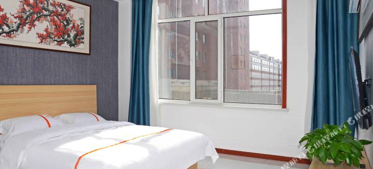 馨洋宾馆(乌兰察布维多利集宁南火车站店)图片