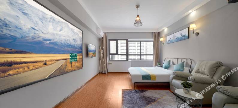 悦冠影音公寓(哈尔滨哈西高铁站万达广场店)图片