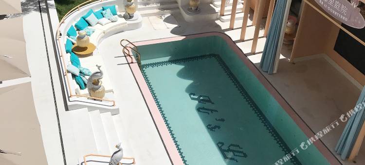 南客里里·The Hideaway·孔雀王庭花园度假酒店(星光夜市店)图片