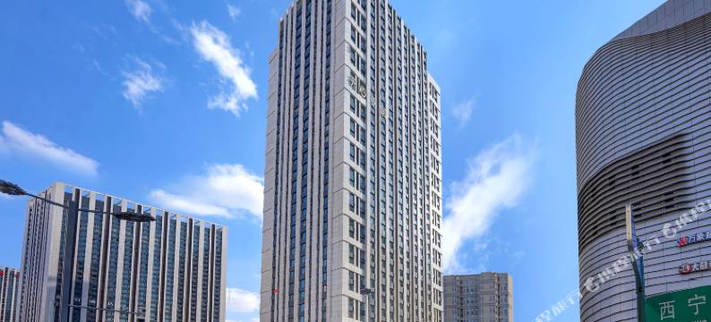 开心曼居酒店(哈尔滨哈西高铁西站万达广场店)图片