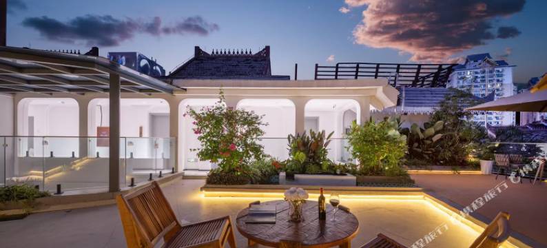 云舒美季花园酒店(西双版纳景洪曼听公园江边夜市店)图片