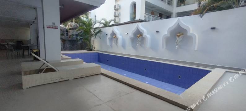 米娅雨林美宿酒店(告庄西双景星光夜市店)图片