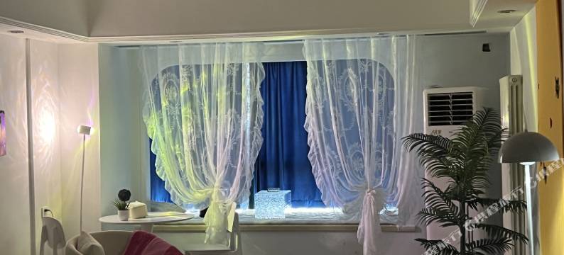 不晚民宿(万达广场店)图片