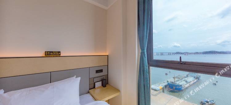 舟山橙子酒店(普陀山机场半升洞码头店)图片