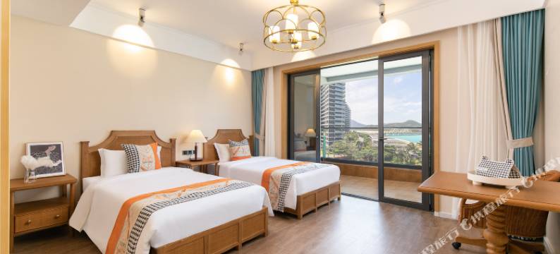 爱上浪花冲浪海景公寓(万宁融创日月湾店)图片