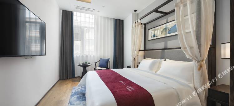 仟那酒店(新密市中强光年店)图片