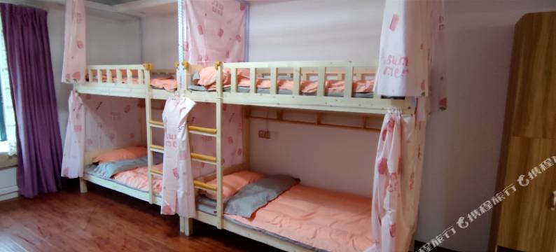 东篱青年旅舍(信阳火车站天润广场店)图片