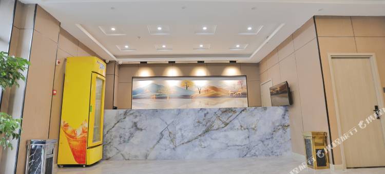 长春芒果宾馆(上海路万达广场活力城店)图片