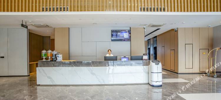 艺龙万国酒店(扬州仪征工农路地铁站店)图片