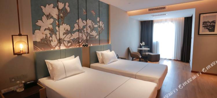 白玉兰酒店(成都海峡茶城三河场地铁站店)图片