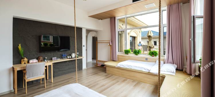 花筑·悦汐汇温泉民宿(金石滩快乐海岸店)图片