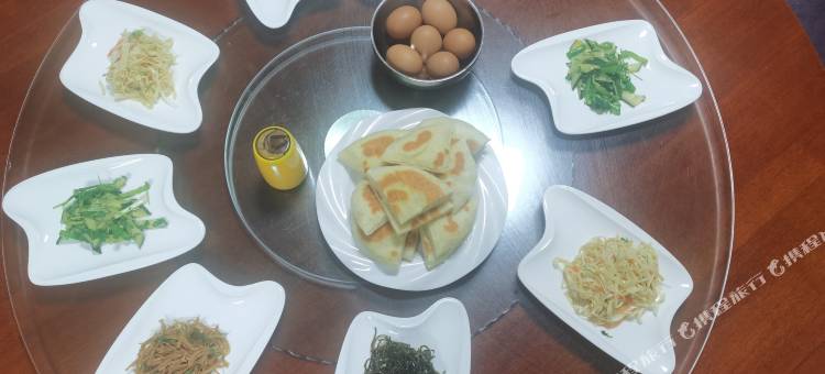 根河市满归镇暖冬宾馆图片