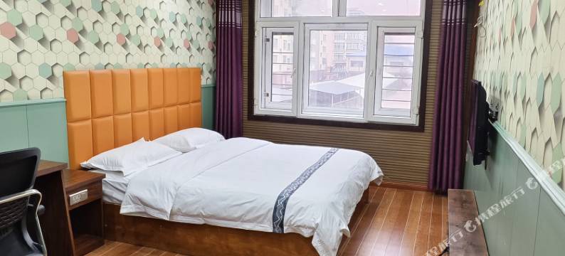 自由空间精品宾馆(青冈县第一中学店)图片