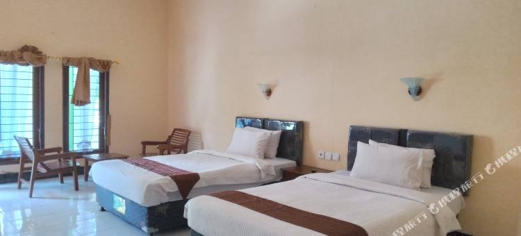 Capital O 93391 金芒果酒店，靠近SMKN 1 Lingsar(Capital O 93391 Golden Manggis Hotel Near Smkn 1 Lingsar)图片