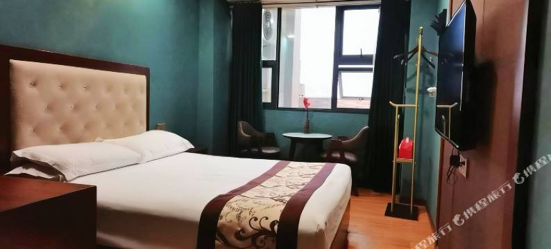 渠县花园商务宾馆(賨人里财富中心店)图片