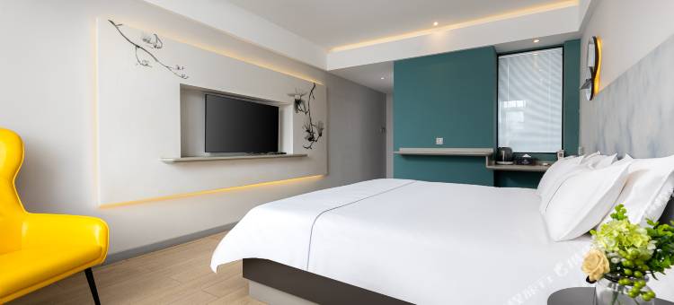 白玉兰酒店(琼海万泉河环球春天广场店)图片