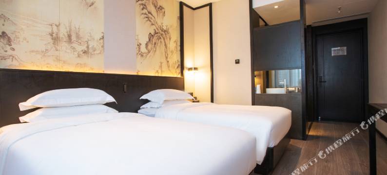 小城顾氏精品文化酒店(长春火车站西安桥轻轨站店)图片