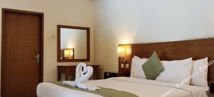 由Cocotel提供的花园家庭客栈。(The Garden Family Guest House Powered by Cocotel)图片