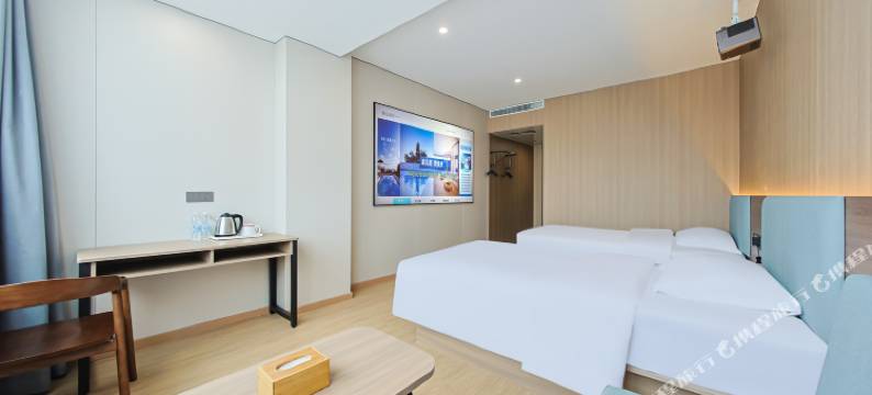 懒虫酒店(许昌曹魏古城胖东来生活广场店)图片