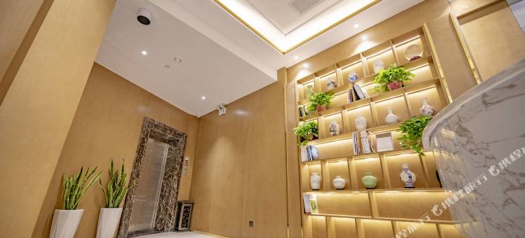 阜阳自然醒春季酒店(颍州文峰公园二里井夜市店)图片