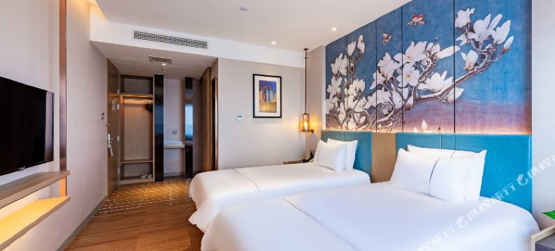 白玉兰酒店(平泉府前花园店)图片