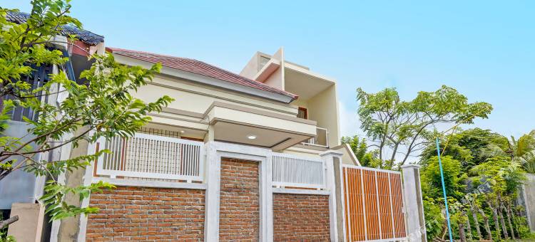 OYO 92209 康戈里科家庭民宿(Kanggo Riko Family Homestay Mitra Reddoorz)图片